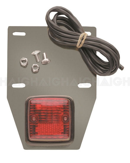 The Mean Mother 4x4 Bike Rack Tail Light kit includes a red rectangular tail light, black wiring, a mounting bracket, and three silver screws with matching nuts, all shown on a white background.