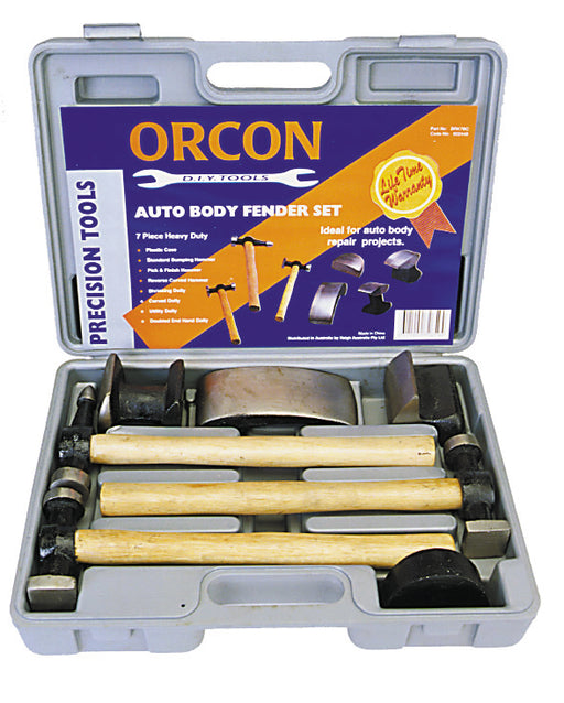 A gray case labeled "Mean Mother 4x4 Bodyrepair Kit H/Duty 7Pc Blow-M Case" contains seven heavy-duty auto body repair tools with wooden handles. The lid displays the list of contents and features, including an "All Time Warranty" badge.