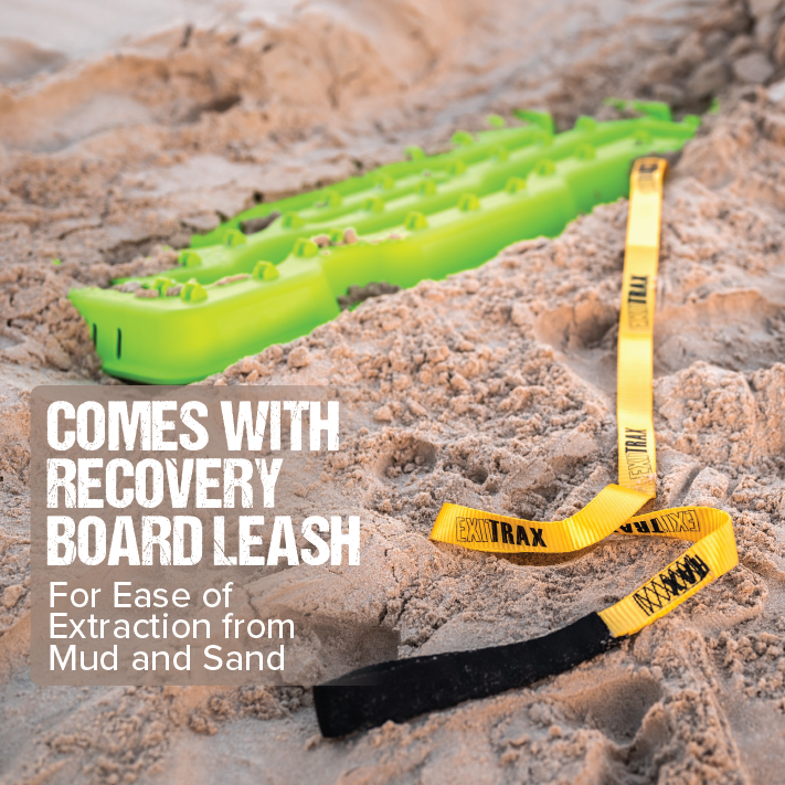 A striking Blood Orange Exitrax Recovery Board Ultimate 1150 is partially buried in sand, featuring a yellow and black leash for ease of extraction from mud and sand. Text in the image reads, "COMES WITH RECOVERY BOARD LEASH For Ease of Extraction from Mud and Sand," ensuring traction enhancement with a lifetime warranty.