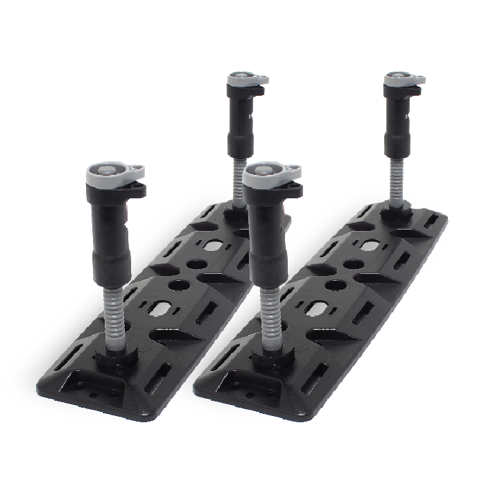 The Exitrax Recovery Board Ultimate 1150 - Blood Orange, Pair + Recovery Board Mounts Bundle features two black adjustable furniture legs with screws, mounted on rectangular bases. The bases have multiple holes for attachment, and each leg includes a threaded rod for height adjustment. One leg is positioned vertically, while the other is angled slightly.