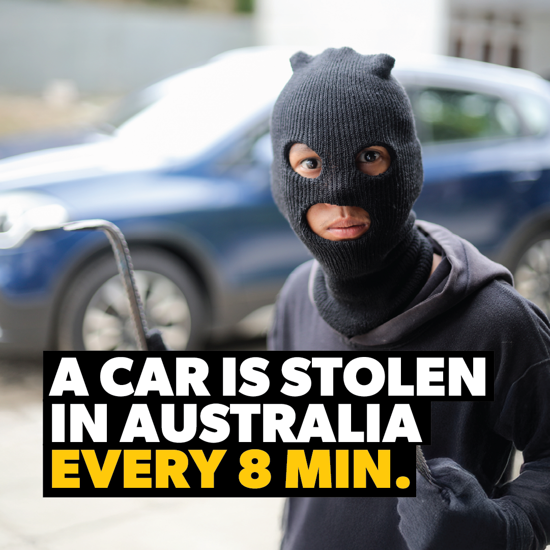 A person in a black ski mask holding a crowbar stands by a parked car. Bold text reads: "Every 8 min, a car is stolen in Australia. Secure yours with the Sperling Steering Wheel Lock Prolock for added protection.