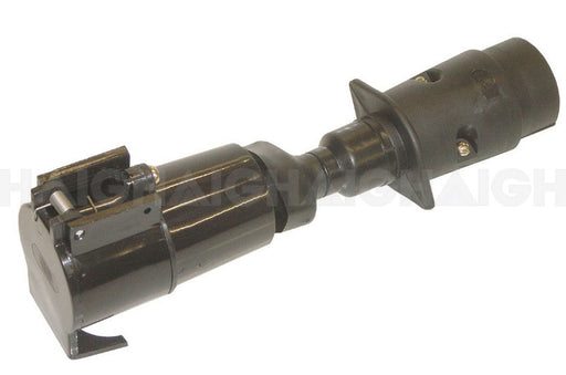 The Mean Mother 4x4 T-Adaptor 7Pin Plug Lge-5Pin Socket Lge is a durable black cylindrical connector with a locking mechanism, designed for securely plugging and securing electrical cables in industrial settings.