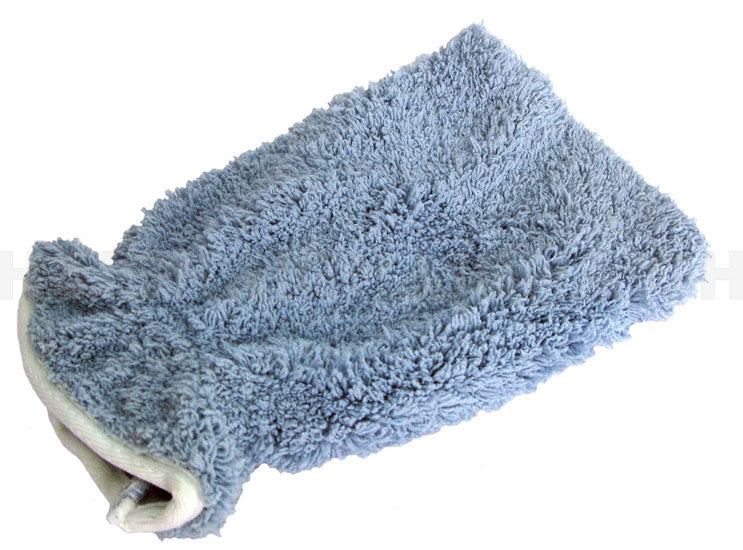 The Mean Mother 4x4 Cleaning Mitt Microfiber is a fluffy gray wash mitt with a white cuff, ideal for cleaning or washing surfaces like cars.
