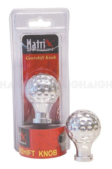A silver, dimpled Gear Shift Knob by Mean Mother 4x4 is shown inside clear packaging labeled "Gear Shift Knob" and also displayed outside of the box.