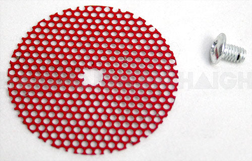 A Mean Mother 4x4 Filter Cover Suit Ac475, a round red perforated metal disc with a central hole, is shown next to a small silver screw on a white surface.