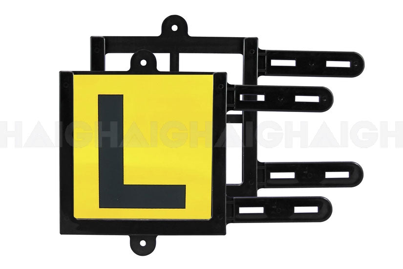 The Mean Mother 4x4 P & L Plate Holder Plastic Universal is a yellow and black learner driver's “L” plate featuring adjustable black plastic brackets for easy mounting on your vehicle.