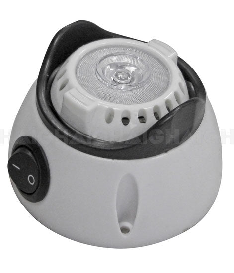 A close-up of the Mean Mother 4x4 Swivel 1 Watt LED 12-24V, a compact round white electronic device featuring a black on/off switch and central transparent lens, ideal as a portable LED lamp.