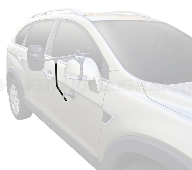 A Mean Mother 4x4 Mirror Support Arm Suit Mh3007 is attached to the driver’s side of a silver SUV, enhancing rear visibility when towing large trailers or caravans.