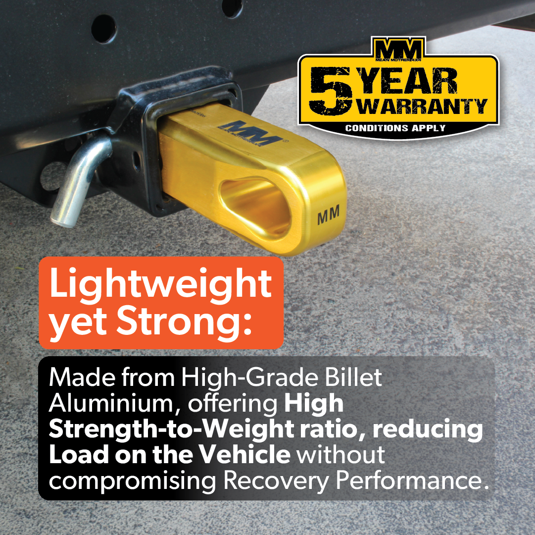 A Mean Mother 4x4 Recovery Hitch, crafted from high-grade billet aluminium and finished in gold, is attached to a vehicle. A "5 Year Warranty" badge highlights its lightweight build and superior strength-to-weight ratio.