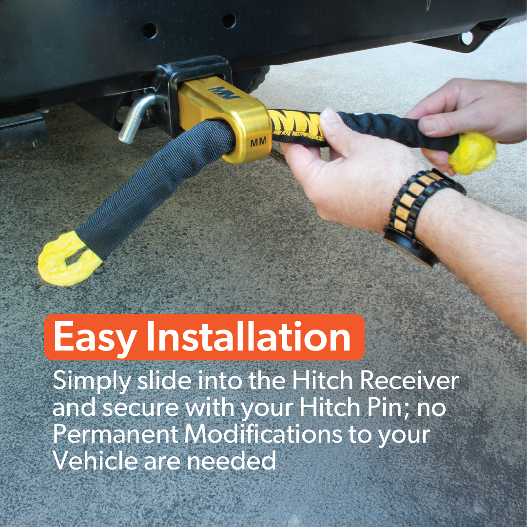 A person attaches the Mean Mother 4x4 Recovery Hitch to a vehicle, with text overlay: "Easy installation—just slide the Recovery Hitch into your receiver and secure with a pin; no permanent modifications required.