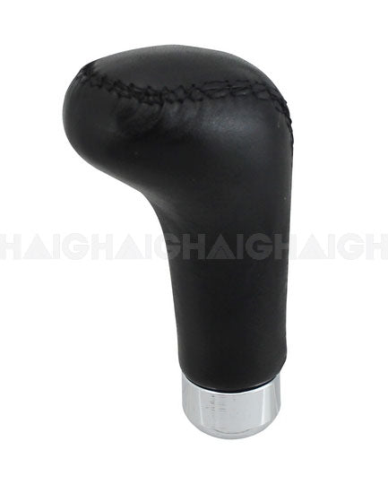 The Mean Mother 4x4 Gear Knob Black Leather Finish features visible top stitching and a silver metallic base, shown against a white background.