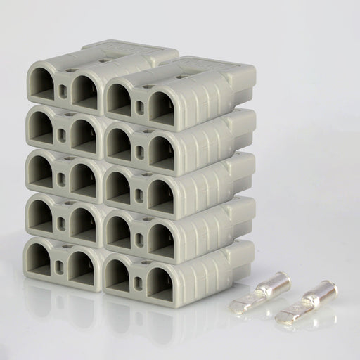 A neatly stacked group of gray connectors from the Mean Mother 10 Pce 50Amp Anderson Style Connector Pack is pictured against a plain background. Two additional silver-plated copper terminals from the Mean Mother brand are placed beside the stack, ideal for automotive applications.