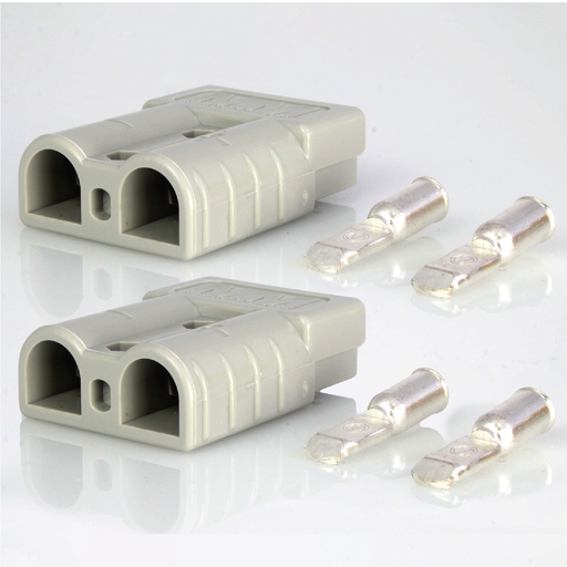 This image shows the Mean Mother 2 Pce 50Amp Anderson Style Pack, featuring two grey connectors from the Mean Mother brand alongside four silver contact terminals. The 50 AMP connectors have a dual port design with ribbed surfaces for better grip, making them ideal for automotive applications. The contact terminals are sized to fit inside the ports for secure electrical connections.